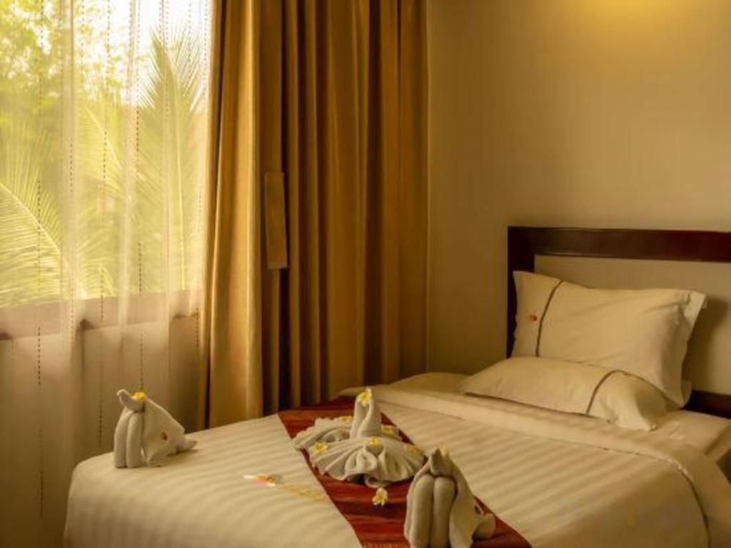 Xishuangbanna Hotel Managed By Xandria Hotel Luang Prabang Exterior foto